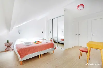 Un ou plusieurs lits dans un hébergement de l'établissement Beautiful apartment- 3BR-10P - Montparnasse