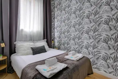 Un ou plusieurs lits dans un hébergement de l'établissement 195 Suite Royal - Superb apartment in Paris
