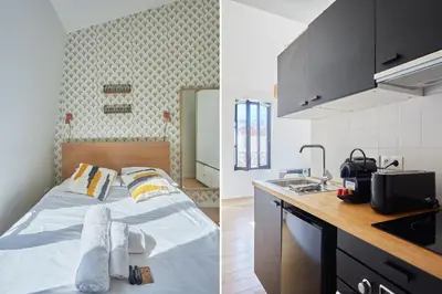 Un ou plusieurs lits dans un hébergement de l'établissement Residence Boulogne Centre le passage by Studio prestige