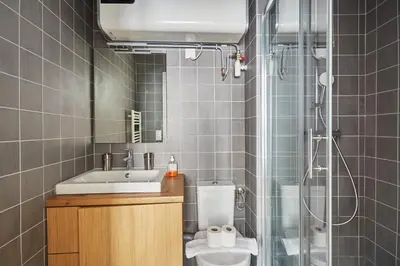 Salle de bains dans l'établissement Residence Boulogne Centre le passage by Studio prestige