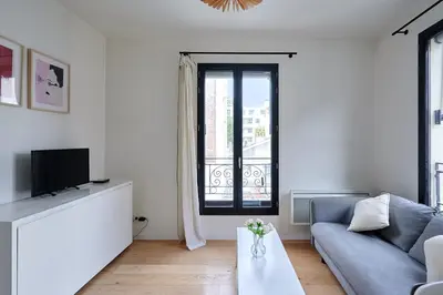Télévision ou salle de divertissement dans l'établissement Residence Boulogne Centre le passage by Studio prestige