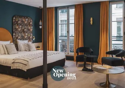 Un ou plusieurs lits dans un hébergement de l'établissement Dandy Hotel