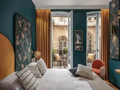 Un ou plusieurs lits dans un hébergement de l'établissement Dandy Hotel