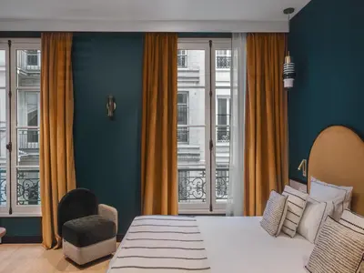 Un ou plusieurs lits dans un hébergement de l'établissement Dandy Hotel