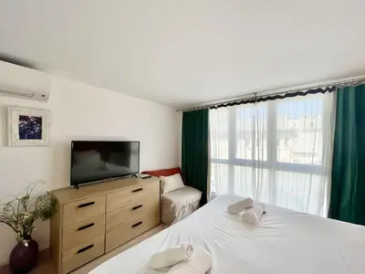 Un ou plusieurs lits dans un hébergement de l'établissement PARISIAN HOME l MONTMARTRE