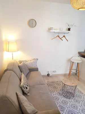 Coin salon dans l'établissement Home Sweet Home Champs Elysées