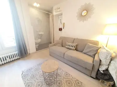 Coin salon dans l'établissement Home Sweet Home Champs Elysées