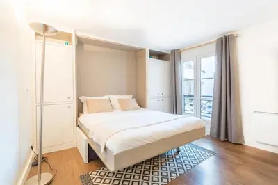 Un ou plusieurs lits dans un hébergement de l'établissement GuestReady-Designer Studio for 2, close to Louvre!