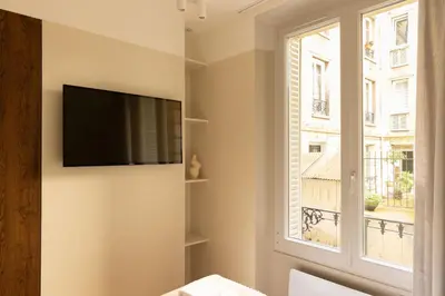 Télévision ou salle de divertissement dans l'établissement Jardin des Plantes - Amazing 2BR 4P apartment
