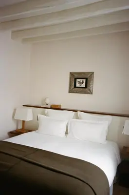 Un ou plusieurs lits dans un hébergement de l'établissement Hôtel Massé