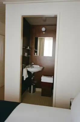 Salle de bains dans l'établissement Hôtel Massé