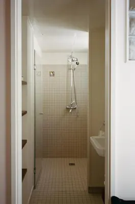 Salle de bains dans l'établissement Hôtel Massé