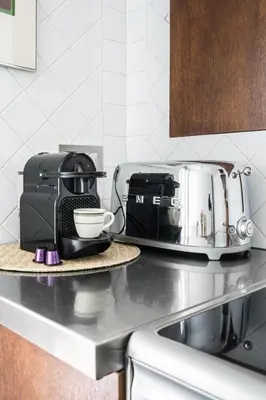 Cuisine ou kitchenette dans l'établissement Pied A Terre Saint Honoré
