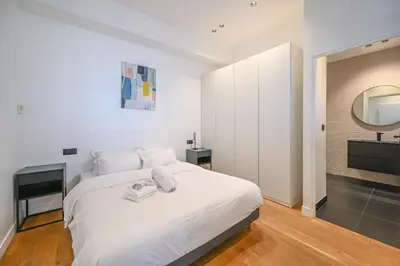 Un ou plusieurs lits dans un hébergement de l'établissement Appartement de Prestige - Grand Varenne