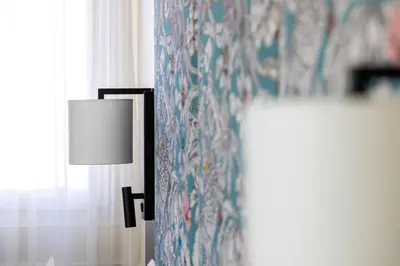 Télévision ou salle de divertissement dans l'établissement Hotel Park Lane Paris