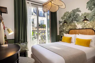 Un ou plusieurs lits dans un hébergement de l'établissement Hotel Lejolly - ex Avalon Cosy