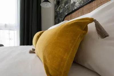 Un ou plusieurs lits dans un hébergement de l'établissement Hotel Lejolly - ex Avalon Cosy
