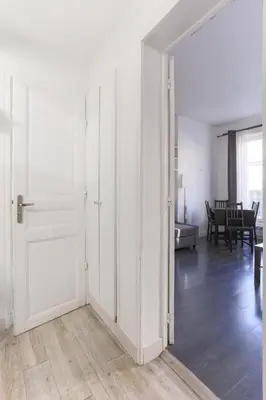 Coin salon dans l'établissement Champs de Mars Appartement