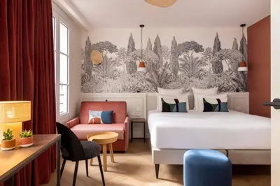 Un ou plusieurs lits dans un hébergement de l'établissement Hôtel La Canopée