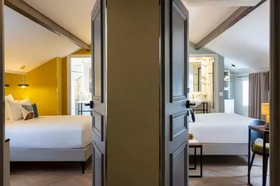 Un ou plusieurs lits dans un hébergement de l'établissement Hôtel La Canopée