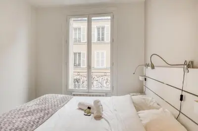 Un ou plusieurs lits dans un hébergement de l'établissement ParisConciergerie - 1BR apartment close to Bercy