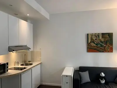 Cuisine ou kitchenette dans l'établissement ParisConciergerie - 1BR apartment close to Bercy