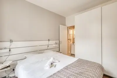 Un ou plusieurs lits dans un hébergement de l'établissement ParisConciergerie - 1BR apartment close to Bercy