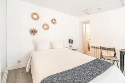 Un ou plusieurs lits dans un hébergement de l'établissement Chatelet Flat