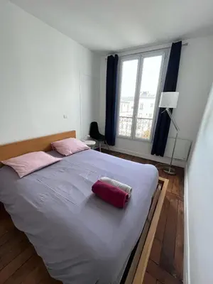 Un ou plusieurs lits dans un hébergement de l'établissement Charming apartment in Montmartre