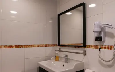 Salle de bains dans l'établissement Hotel Geoffroy Marie Opéra