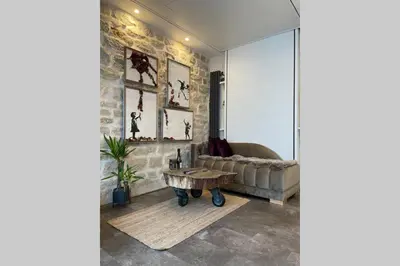 Coin salon dans l'établissement Tiny Gallery Paris Gare Montparnasse