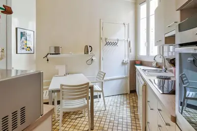 Cuisine ou kitchenette dans l'établissement Appartement Carpette - Welkeys