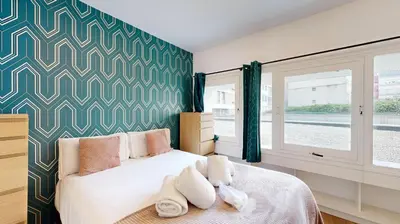 Un ou plusieurs lits dans un hébergement de l'établissement 199 Suite Monopoly - Superb Apartment in Paris