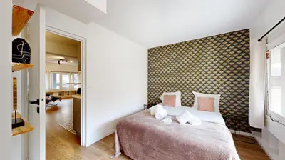 Un ou plusieurs lits dans un hébergement de l'établissement 199 Suite Monopoly - Superb Apartment in Paris