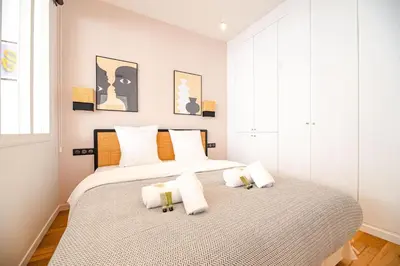 Un ou plusieurs lits dans un hébergement de l'établissement MBM - LOFT MARAIS