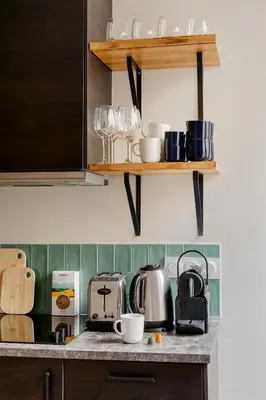 Cuisine ou kitchenette dans l'établissement Edgar Suites Grands Boulevards - Boulanger