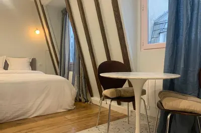 Un ou plusieurs lits dans un hébergement de l'établissement Paris 4 Le Marais Rue de Rivoli - City Hall - Aldaro