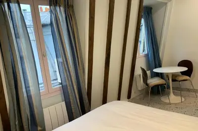 Un ou plusieurs lits dans un hébergement de l'établissement Paris 4 Le Marais Rue de Rivoli - City Hall - Aldaro