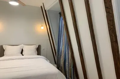 Un ou plusieurs lits dans un hébergement de l'établissement Paris 4 Le Marais Rue de Rivoli - City Hall - Aldaro