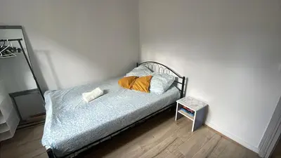 Un ou plusieurs lits dans un hébergement de l'établissement Studio Montmartre 15 min du Sacré-Cœur, cosy & chauffé