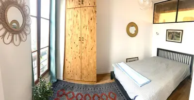 Un ou plusieurs lits dans un hébergement de l'établissement Beautiful flat in Paris Montorgueil, free parking