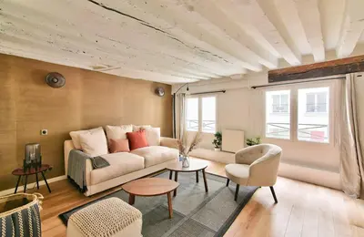 Coin salon dans l'établissement GuestReady - Apt de charme - Jardin des Tuileries