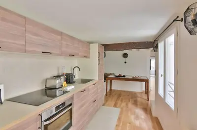 Cuisine ou kitchenette dans l'établissement GuestReady - Apt de charme - Jardin des Tuileries