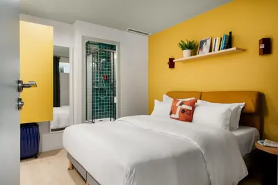 Un ou plusieurs lits dans un hébergement de l'établissement Edgar Suites Vicat - Porte de Versailles