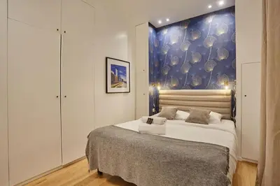 Un ou plusieurs lits dans un hébergement de l'établissement New Apartment 2 bedrooms center of Paris by Studio prestige