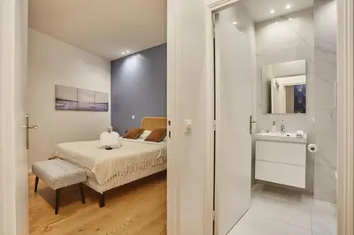 Un ou plusieurs lits dans un hébergement de l'établissement New Apartment 2 bedrooms center of Paris by Studio prestige