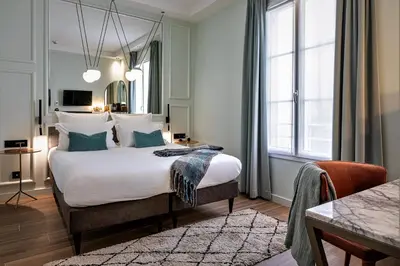 Un ou plusieurs lits dans un hébergement de l'établissement Hôtel Veryste & Spa Paris