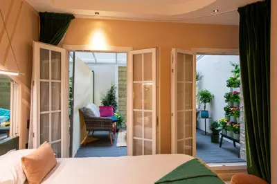 Un ou plusieurs lits dans un hébergement de l'établissement Hôtel Veryste & Spa Paris