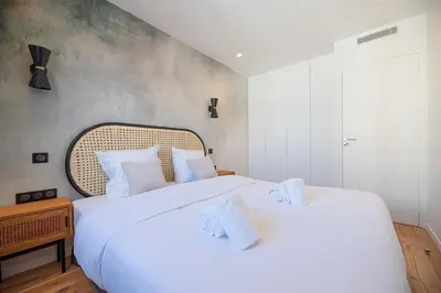 Un ou plusieurs lits dans un hébergement de l'établissement Vignature residence