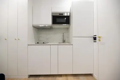 Cuisine ou kitchenette dans l'établissement MBM - CHARONNE